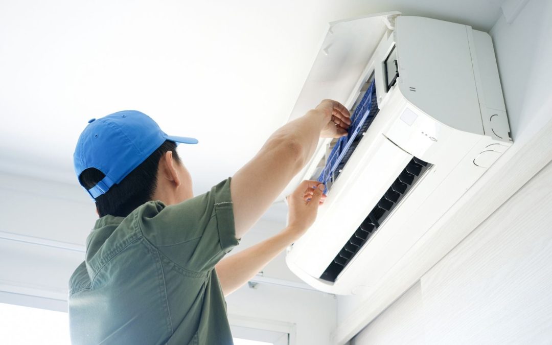 Air conditioning technician maintaining an indoor mini split system in Vail, AZ